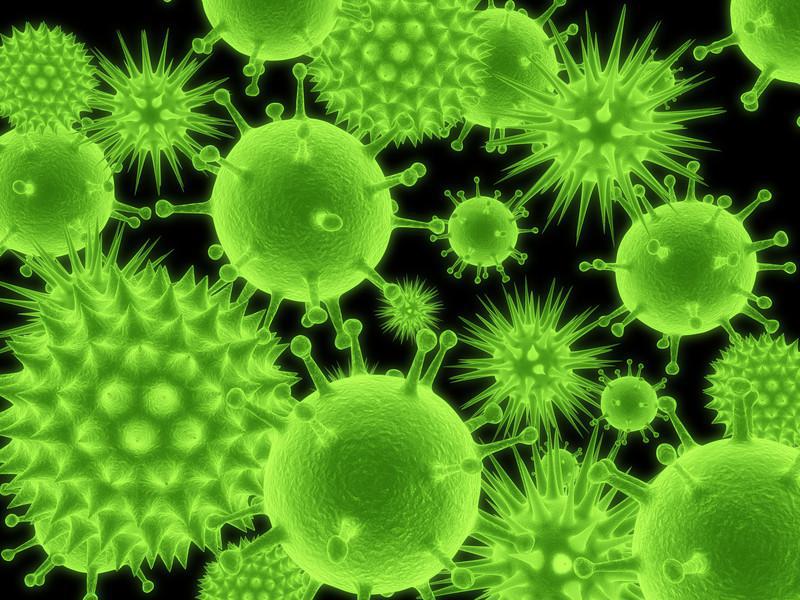 Close-up illustration of microscopic green bacteria or viruses, symbolizing unseen causes of chronic illness.