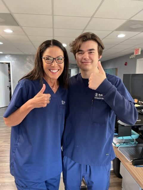 Two Balance Wellspace staff smiling together